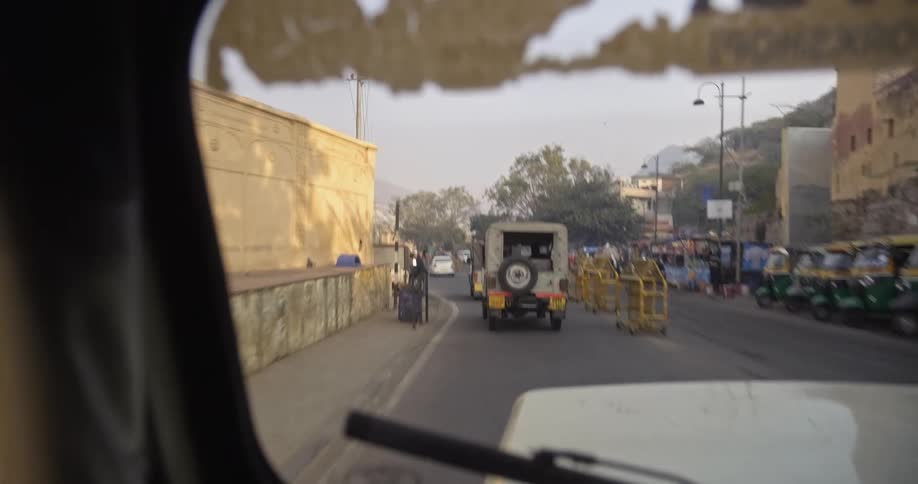 Vehicles are driving down the street