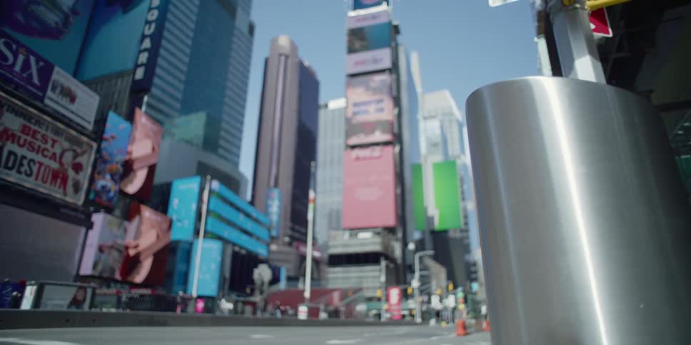Advertisements are displayed on skyscrapers downtown in a city