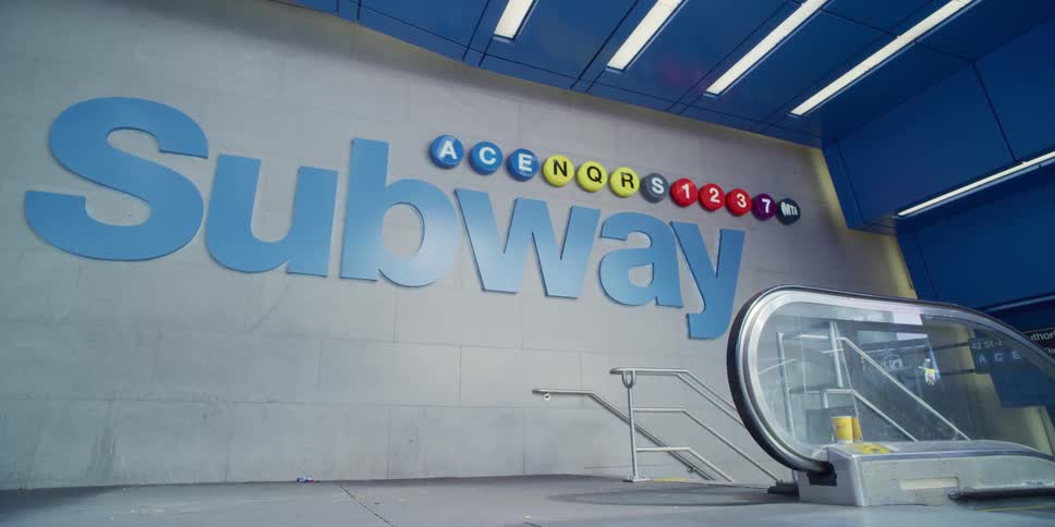Escalator and steps platform at a subway station
