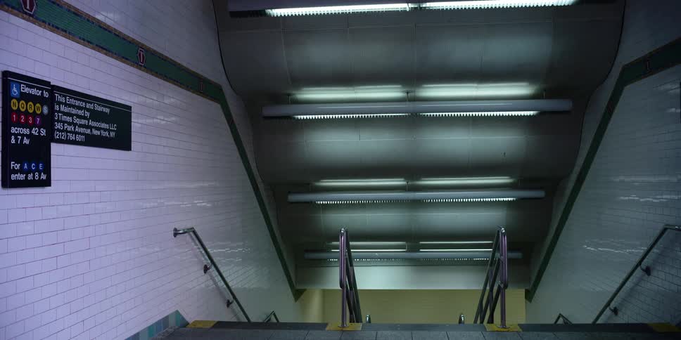 View from the top of the stairs in a train terminal