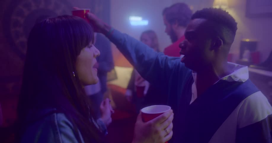 People dance at a party