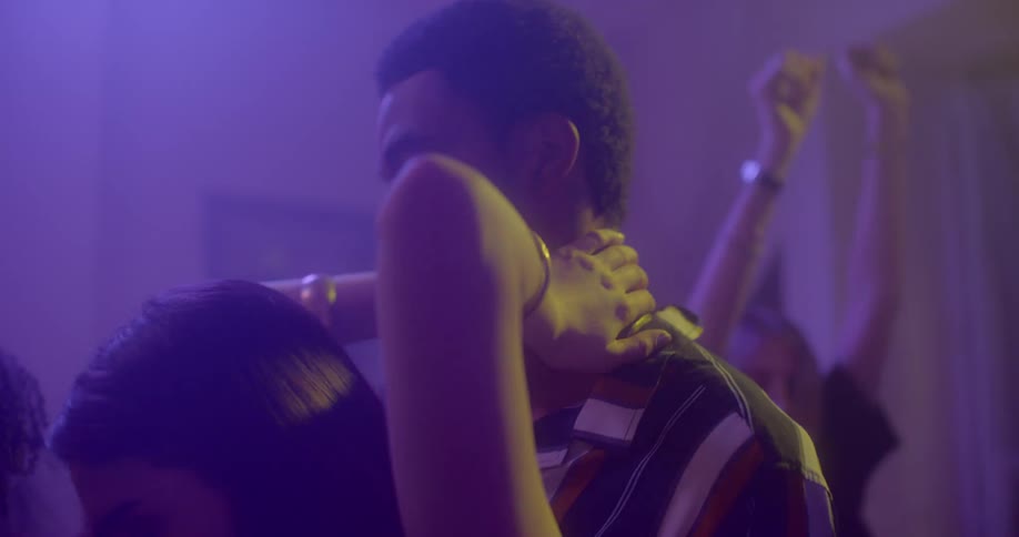 People dance at a party