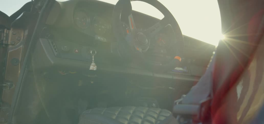 Sun shines into vehicle with open door