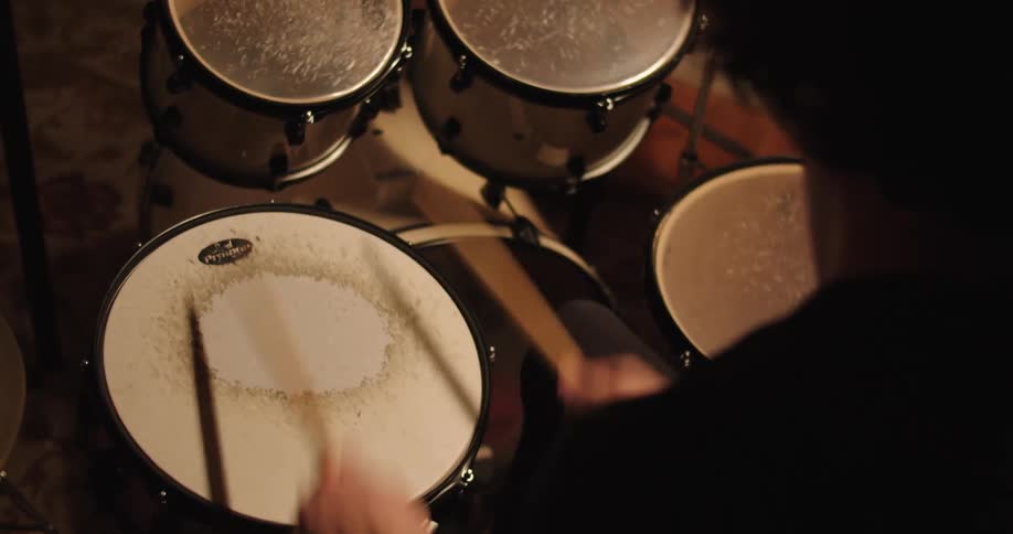 A man plays on the drums