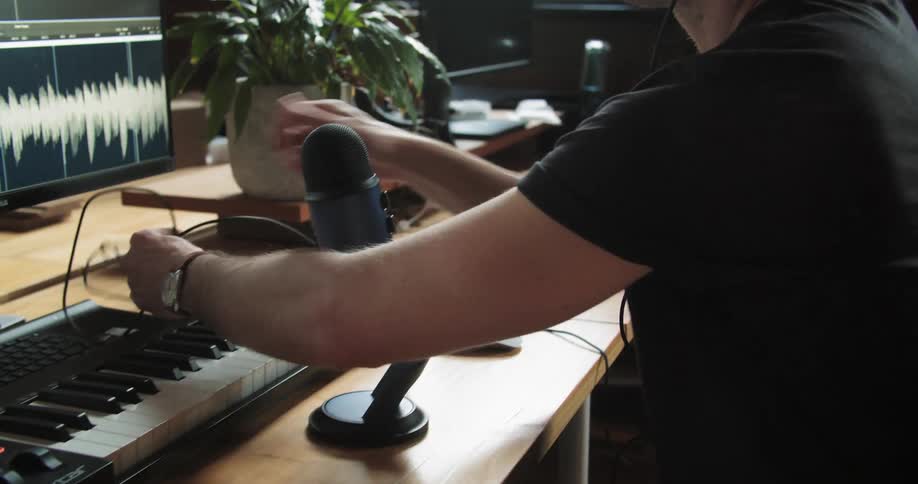 A man sets up the microphone
