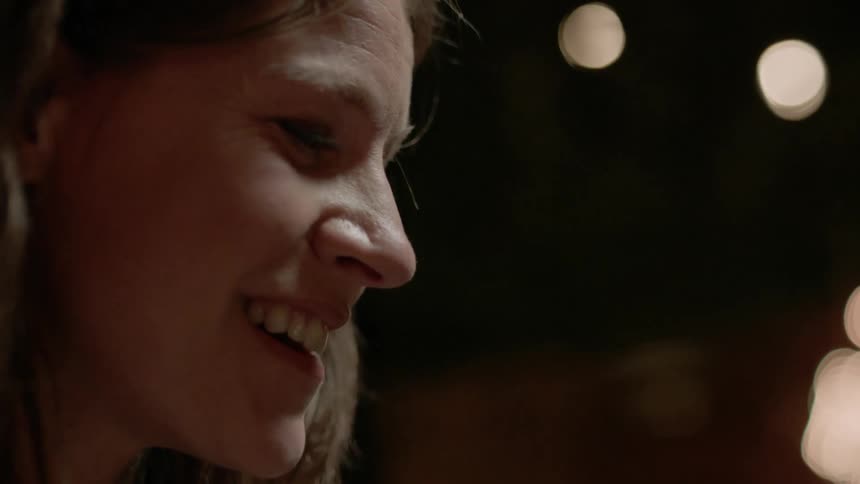 A woman talking and smiling