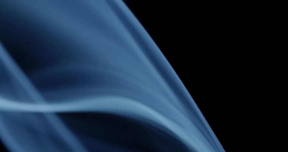 A blue flame burning with a black background