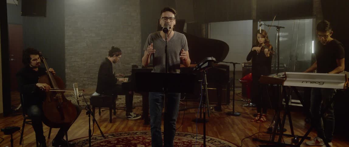 A band is performing in the studio