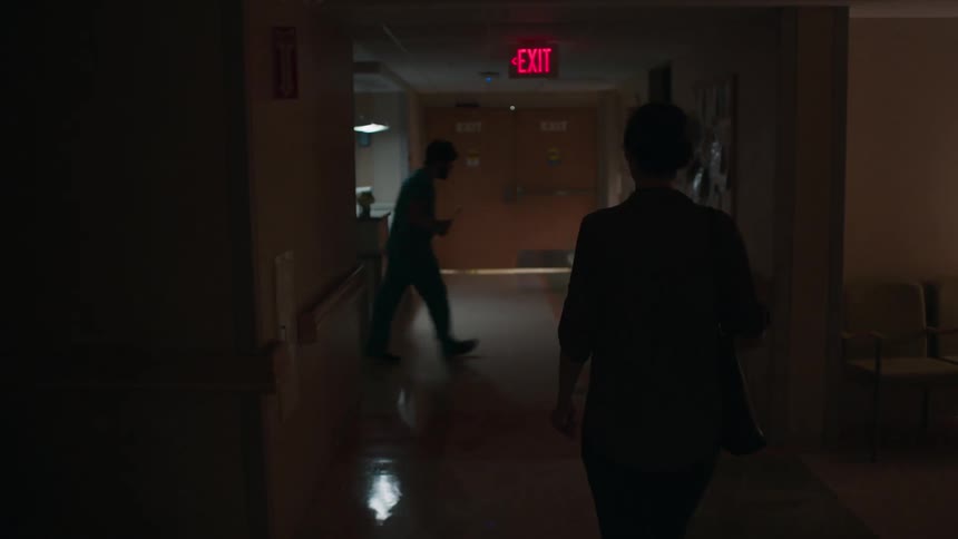 A person walks the hall