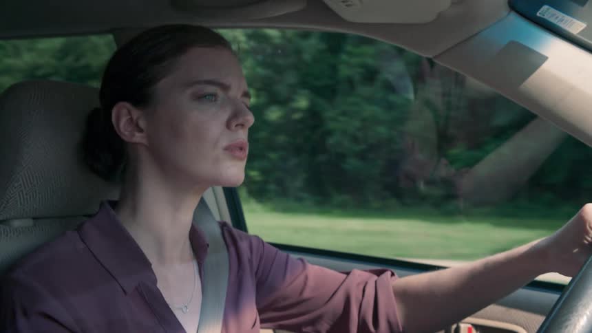 A woman is driving