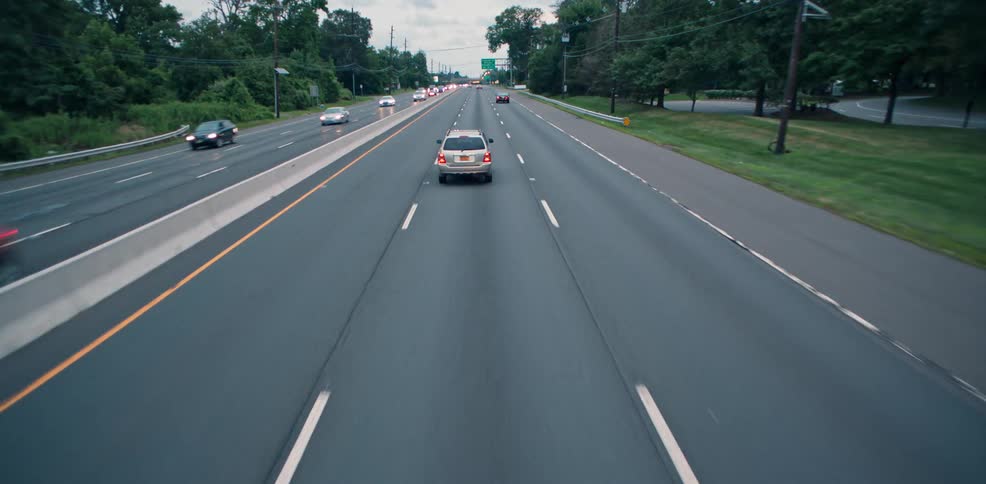Vehicles drive down the freeway