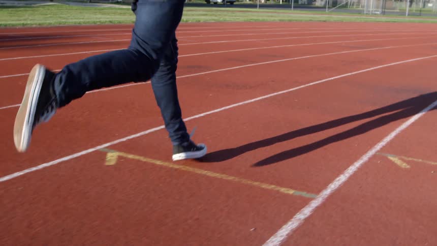 A man running down a track