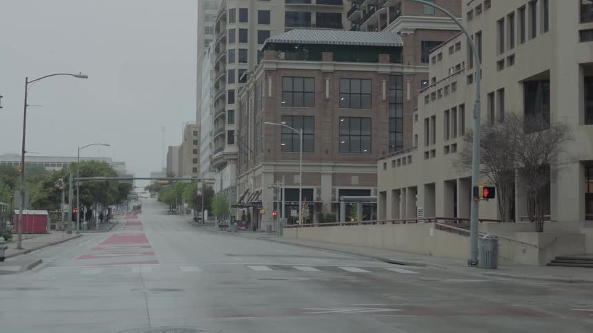 A city street is devoid of vehicles and people