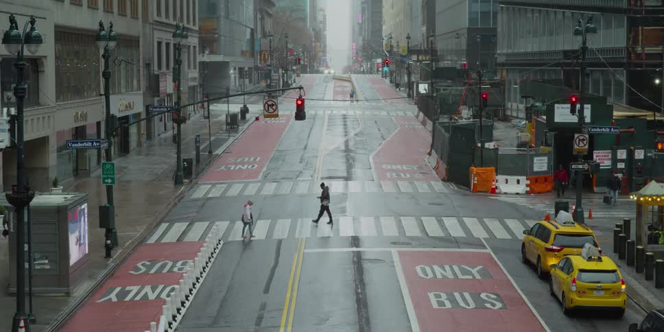 Pedestrians crossing empty new york street
