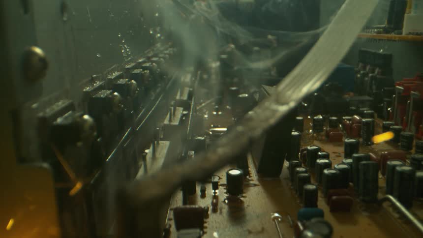 A fire is erupting inside of electrical equipment