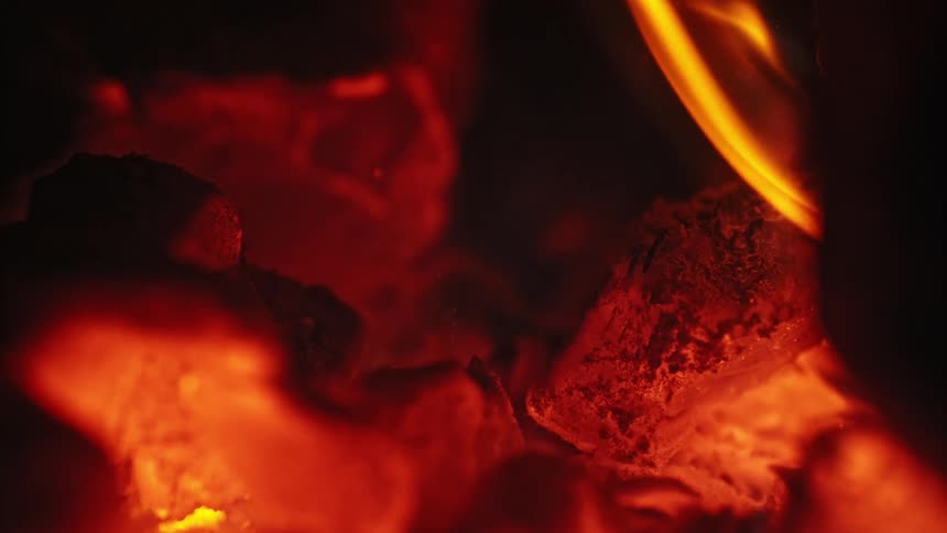 Fire burns amongst embers