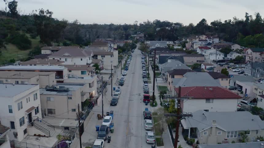 Aerial view of cars parked on a neighborhood street