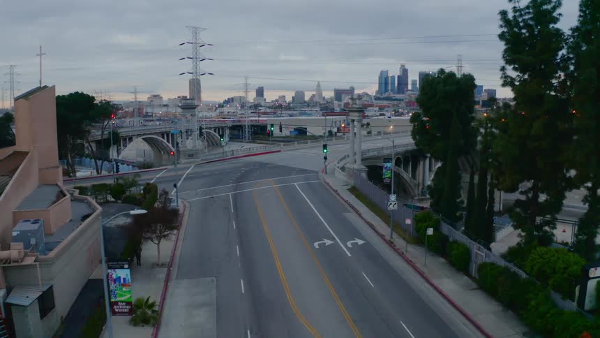 An intersection with people running on the road