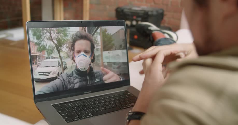 Two people video conferencing together