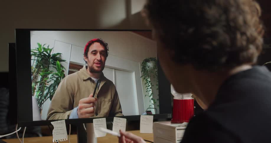 Two men video chat