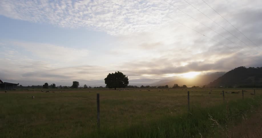 The sun peeks out from behind some clouds