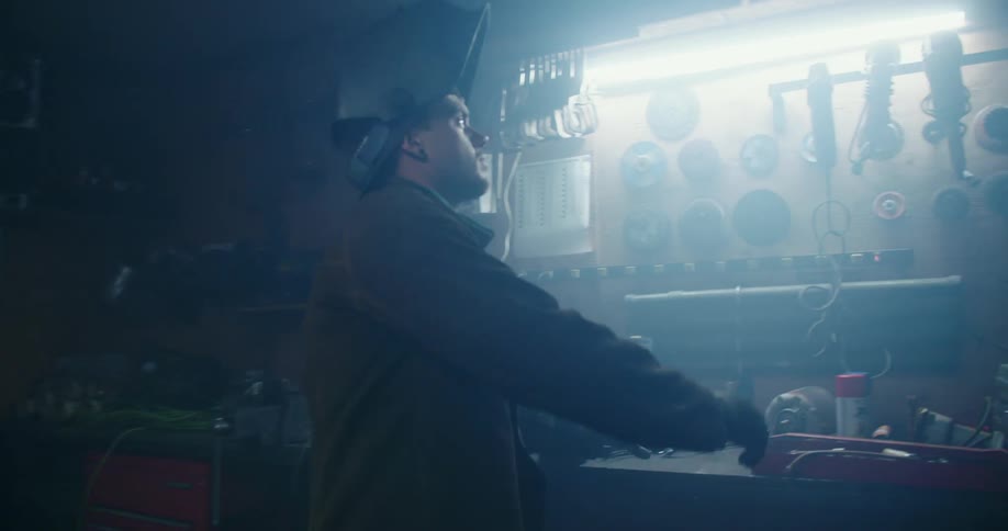 A man is working in a workshop