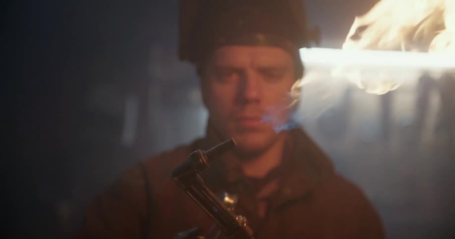 Man lights a propane torch