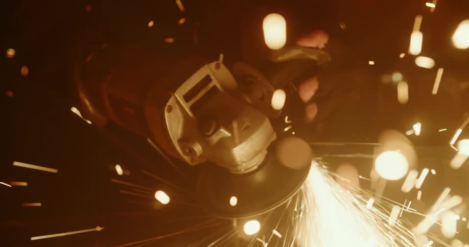 Sparks fly off of a circular saw