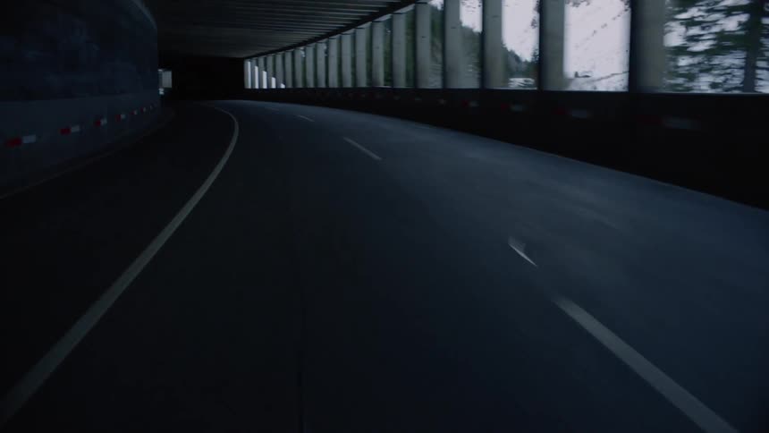 A tunnel along side a mountain