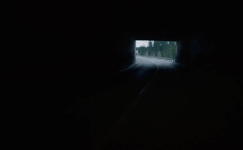 Vehicle drives through the tunnel