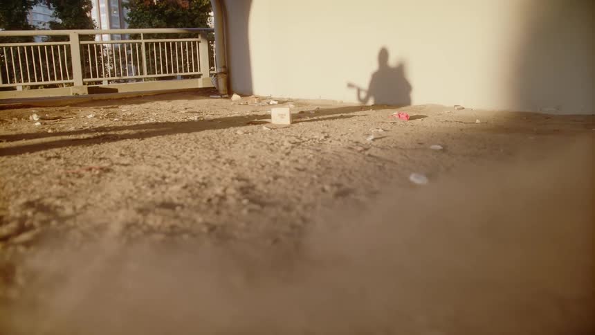 A mans shadow plays guitar