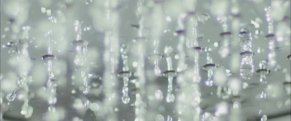 Water falls from a shower head
