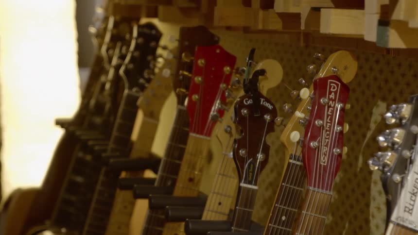 Guitars sit on display