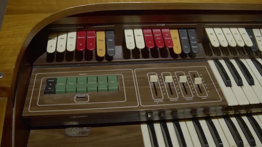 An electronic organ with double keyboard level and pedals