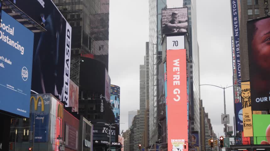 A lit up empty new york street
