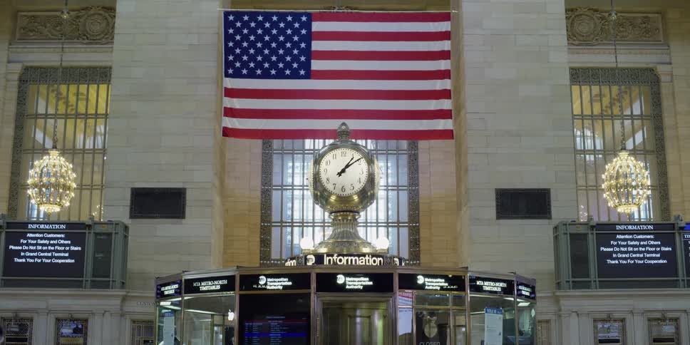 A large flag hangs inside a building