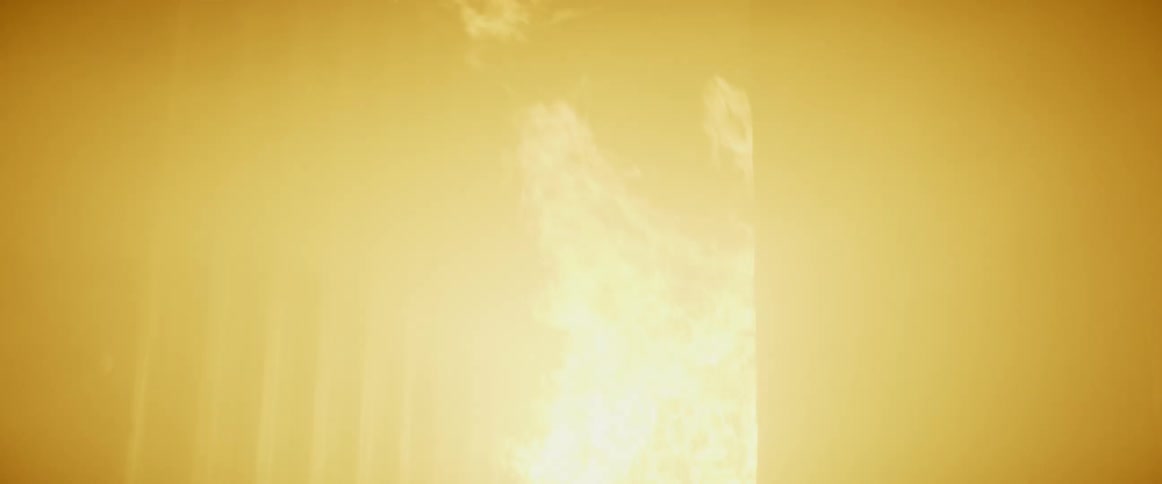 A fire burning inside a house