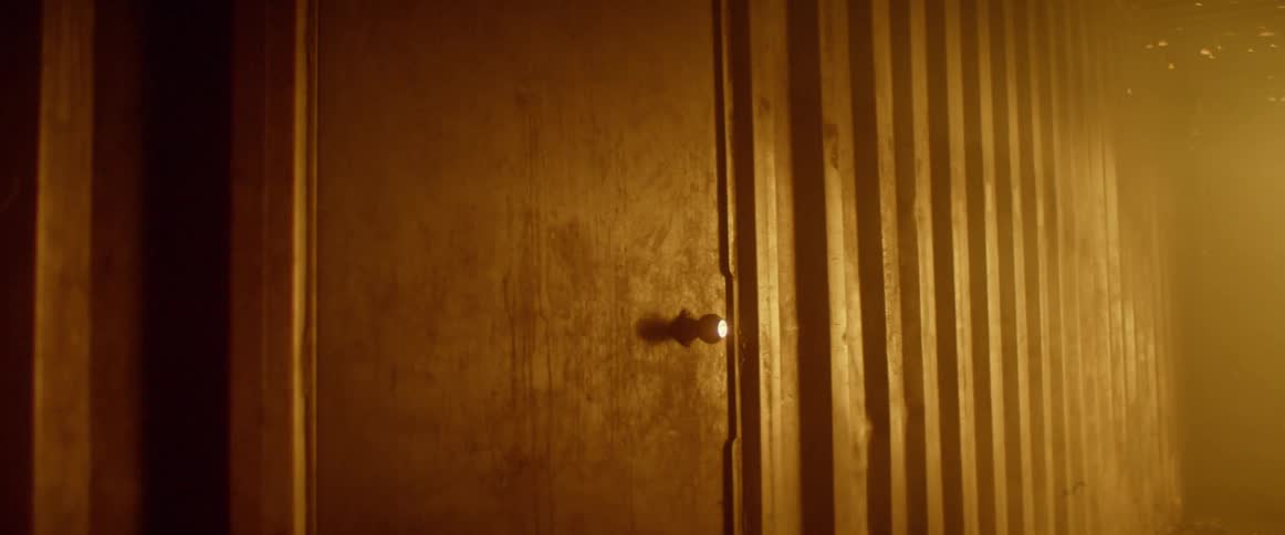 Closed door near to fire inside container