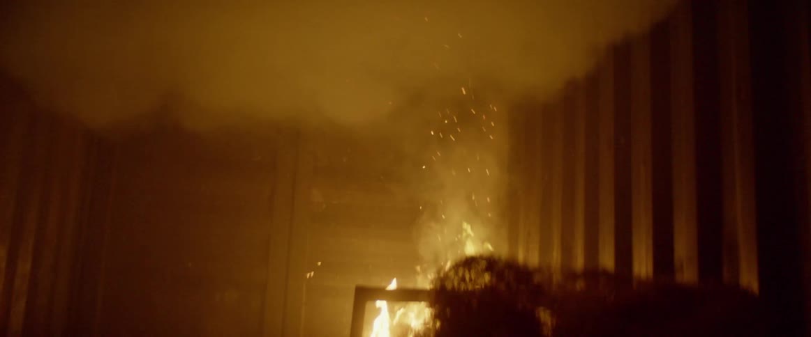 Fire inside a metal container filled with smoke