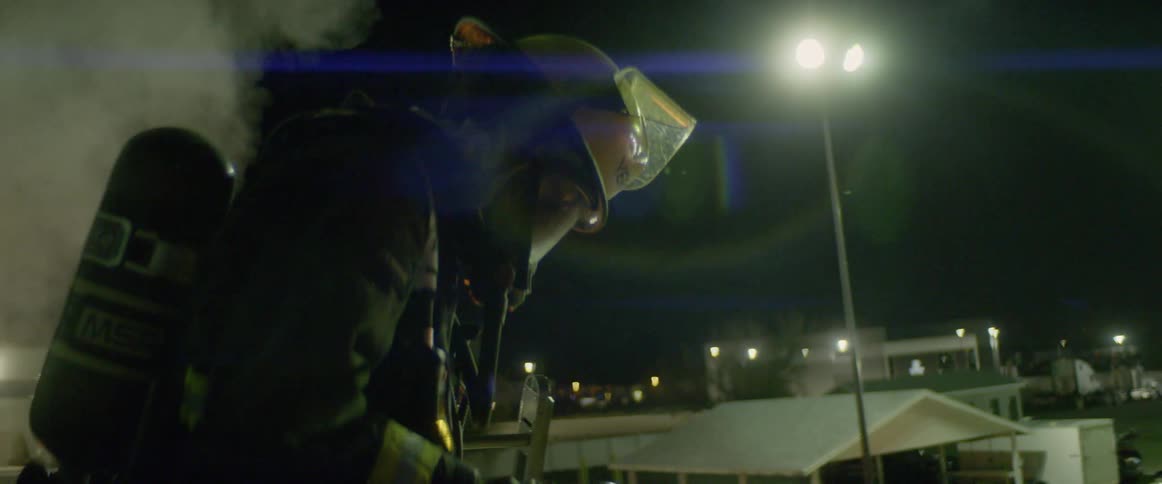 A firefighter working on some equipment