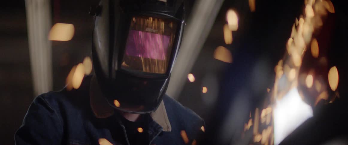 A welder is working in the shop