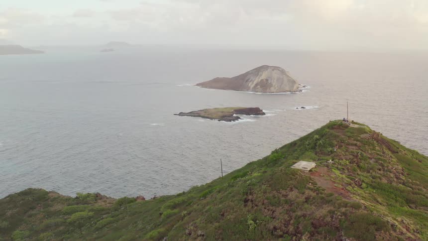 Waves crash to the island