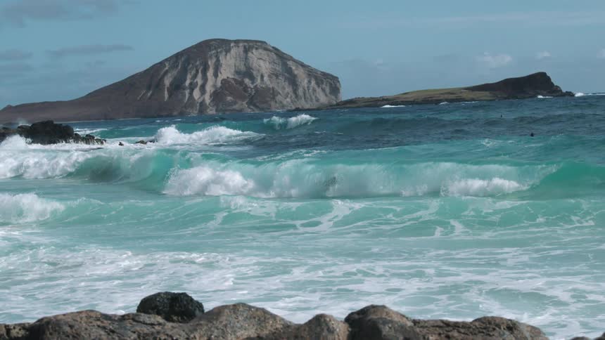 People surfing in the crashing waves
