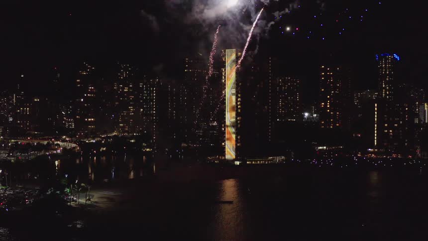 Fireworks going off in a city