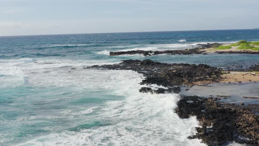 Waves crashing in to the shoreline