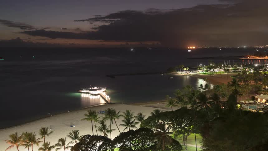 The sun sets on an ocean horizon