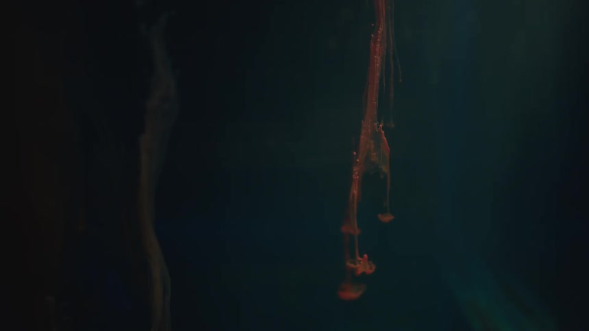 Blue and brown that looks like brown paint submerged in water