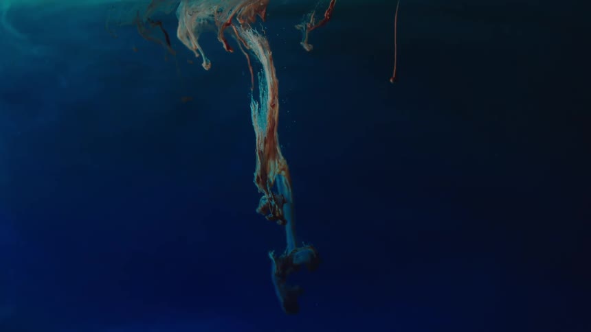 Copper colored formations in water