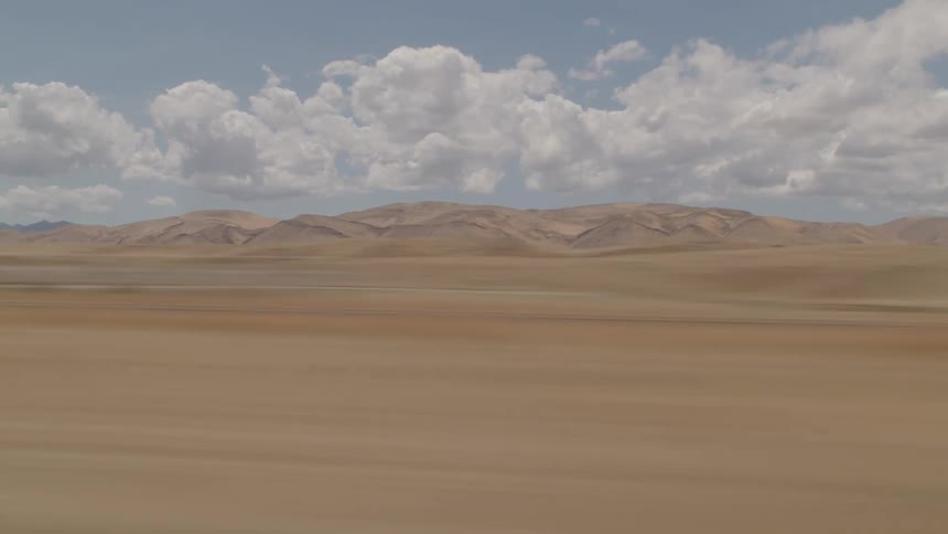 Desert landscape from moving vehicle