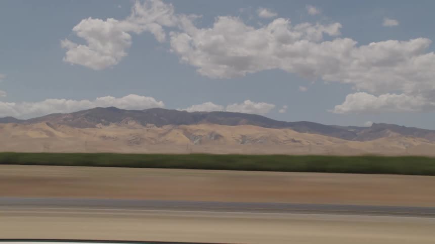 Landscape as a car drives along the highway